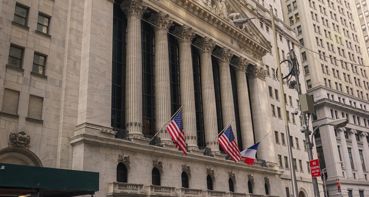 The New York Stock Exchange facade draped with American flags ahead of the July 4th holiday